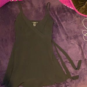 Black romper, with side zipper and side bow.